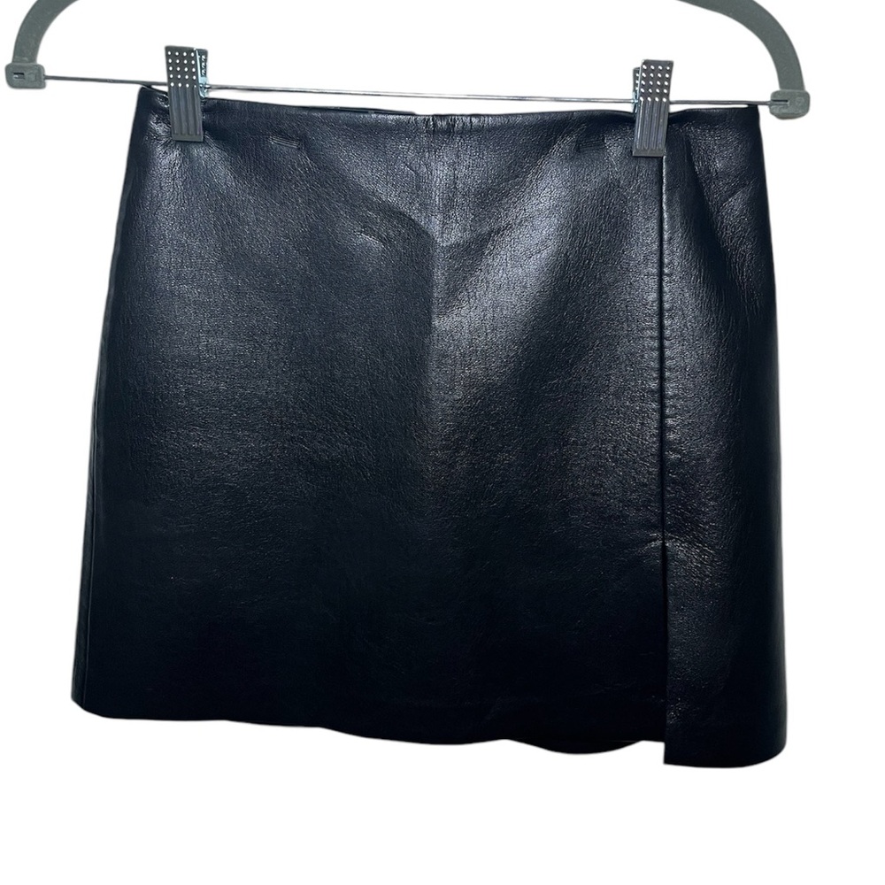 Aritzia vegan leather skirt with a small slit. Size 2.